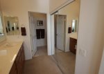 Main suite offers dual vanity and large walk in closet